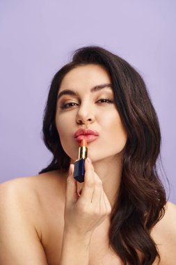 A woman holding a lipstick in front of her face, enhancing her natural beauty with makeup. clipart
