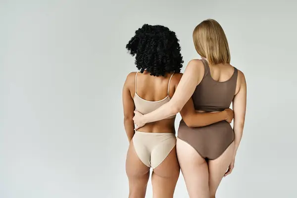 Two Diverse Women Cozy Pastel Underwear Stand Gracefully Side Side — Foto de Stock
