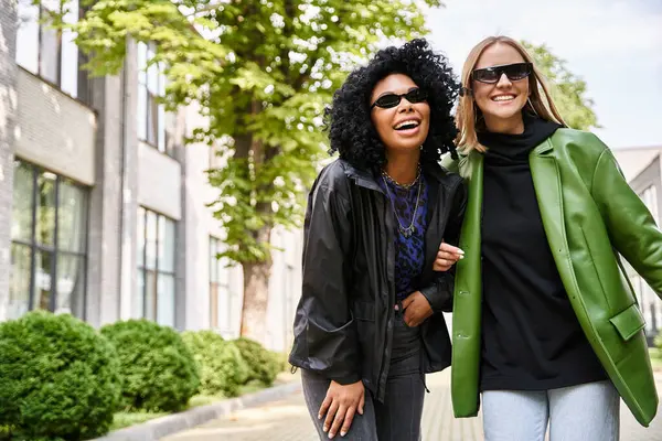 Two Attractive Diverse Women Walk Together City Street Cozy Casual — Foto de Stock