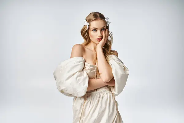Young Blonde Woman Exudes Elegance Studio Setting Wearing White Dress — Stock Photo, Image