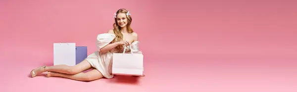 Young Blonde Woman Sits Floor Surrounded Shopping Bag Looking Content — Stock Photo, Image