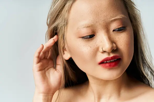 Attractive Asian Woman Vibrant Clothes Showcasing Red Lipstick Close — स्टॉक फोटो, इमेज
