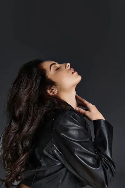 Captivating Young Woman Long Hair Wearing Black Leather Jacket Strikes — Stock Photo, Image