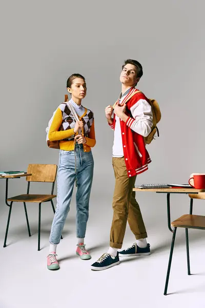 Two Trendy Students Male Female Strike Poses Desk College Classroom — Stockfoto