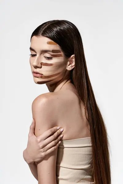 Refined Woman Showcases Her Beauty Makeup Her Face Including Foundation — Fotografia de Stock