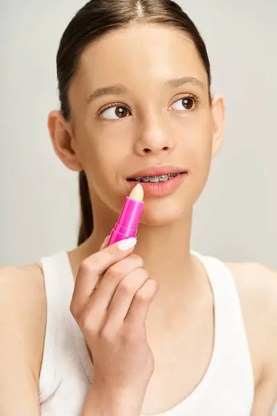 Trendy Teenage Girl Trendy Clothes Holds Pink Lipstick Hand — Foto Stock