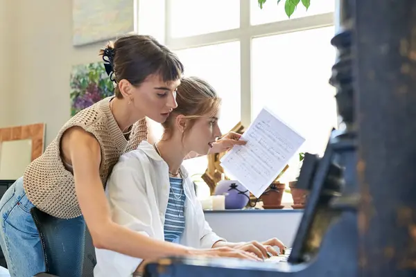 Two Women Piano Immersed Sheet Music — Stock Photo, Image