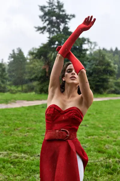 Attractive Young Woman Red Dress Long Gloves Twirls Gracefully Enjoying — 图库照片