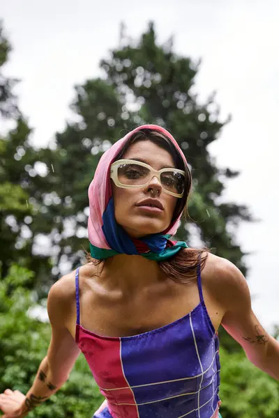 Beautiful Young Woman Vibrant Dress Stylish Sunglasses Enjoying Summer Breeze Stock Image