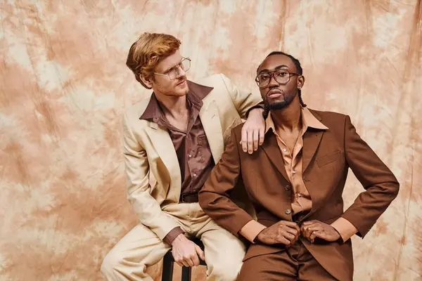 Two Handsome Multicultural Men Elegant Attire Sitting Closely Together — Stock Photo, Image