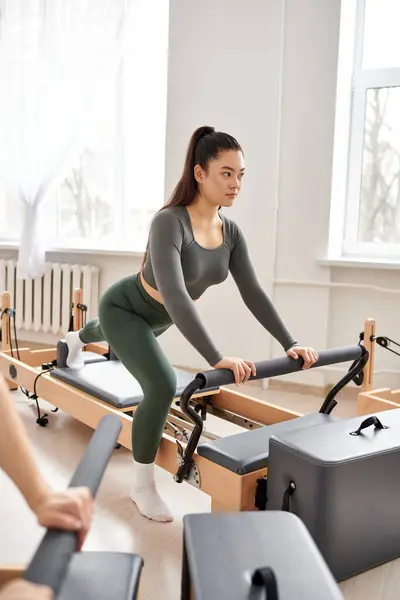 Woman Gracefully Exercising Her Friends — Stock Photo, Image
