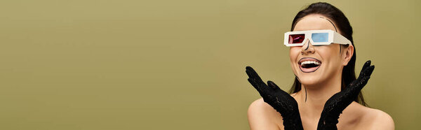 A stylish brunette woman wearing black gloves and 3D glasses, exuding an air of mystery and sophistication.