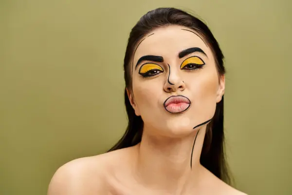 Stock image A stunning brunette woman with yellow eyes, adorned in pop art makeup and black gloves.