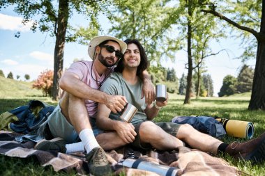 A young gay couple enjoys a summer hike together, sharing a moment of love and connection in the serene wilderness. clipart