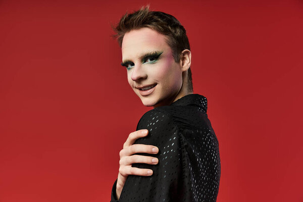 A vibrant drag artist showcases unique fashion and confident expression.