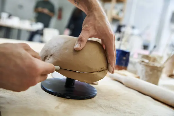 stock image Dedicated appealing man making pottery.