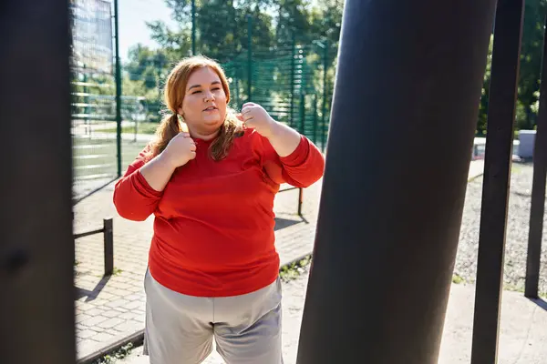 Stock image Engaging in a joyful exercise session outdoors surrounded by nature.