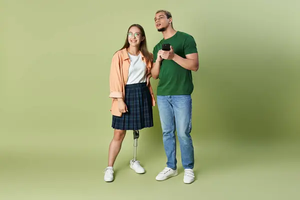 stock image A non binary person and their friend share laughs in a warm, inviting space.