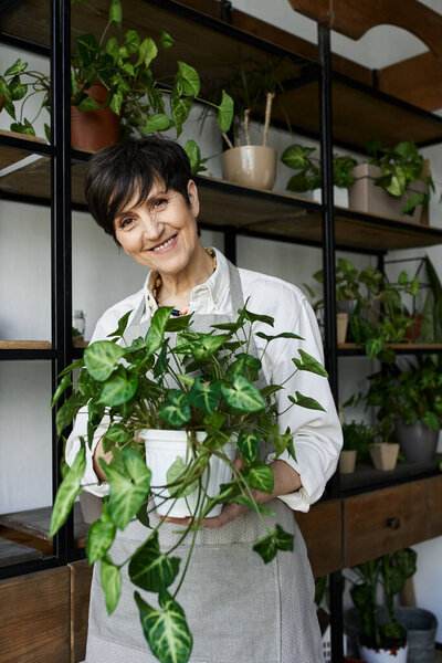 A gardener cares for her plants, enjoying the peaceful atmosphere of her studio.