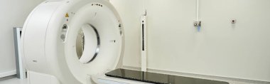 A cutting-edge MRI machine is ready for use in this advanced diagnostic setting, banner clipart