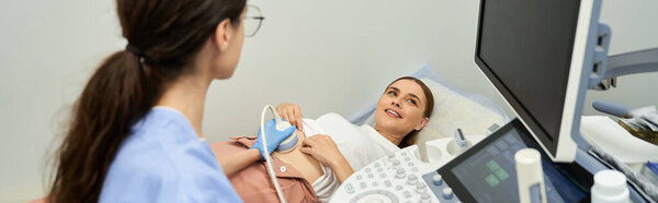 A skilled gynecologist conducts a checkup, ensuring the patient health and comfort.