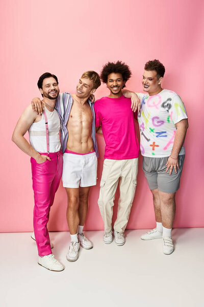 Four friends express joy and solidarity in a vibrant studio, showcasing pride and confidence.