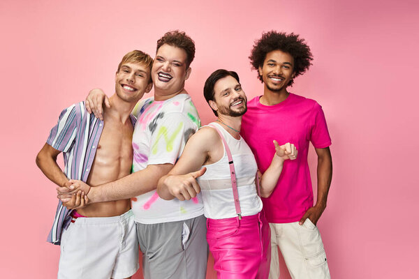 Friends express their LGBTQ pride with vivid fashion and joyful energy in a colorful setting.