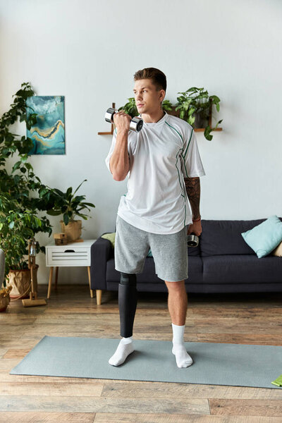 Handsome young man engages in a workout routine while showing strength and determination.