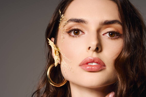 Young woman with brown hair admires flowers in a serene spring atmosphere.