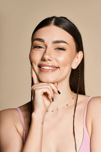 A young woman with a radiant smile showcases her sun-kissed skin while enjoying summer vibes.