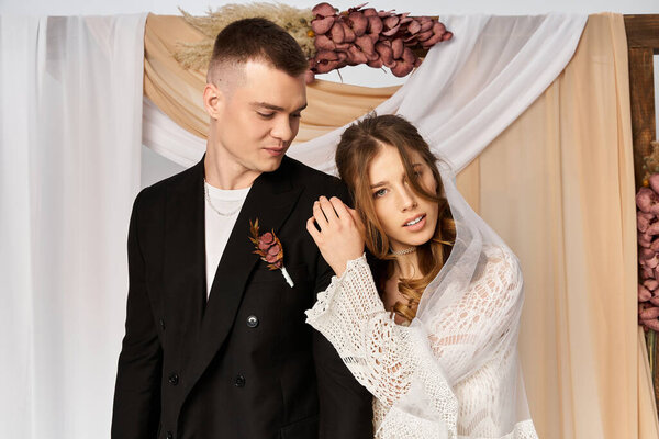 Joyful bride and groom captured amidst stunning decor, radiating romance and happiness.