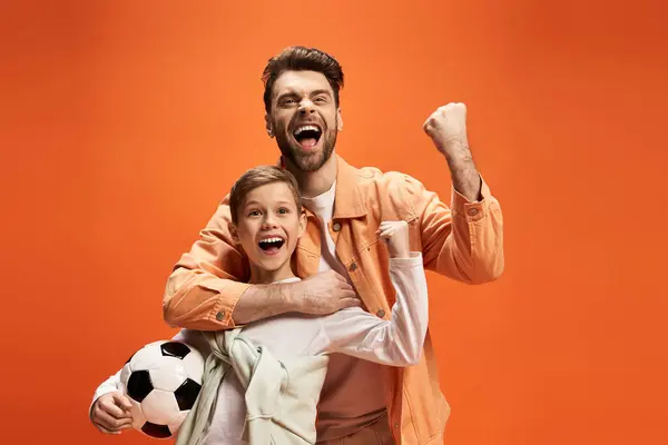 Father and child express excitement and happiness while enjoying a festive Father Day celebration.