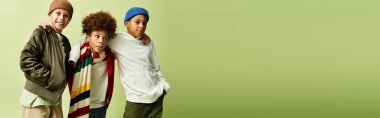 Three boys showcase their unique styles while enjoying their time together, embodying friendship.