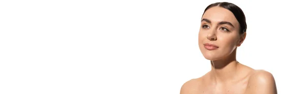 Dreamy woman with naked shoulders looking away isolated on white, banner — Stock Photo