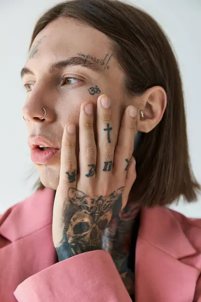 Vertical shot of good looking astonished man with mouth slightly open looking away, fashion concept — Stock Photo