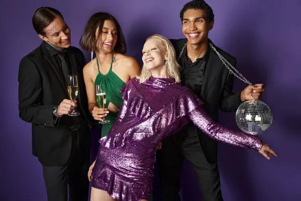 New Year party, group of joyful interracial friends holding glasses of champagne and disco ball — Stock Photo