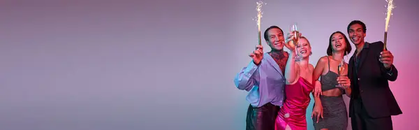 Merry Christmas and Happy New Year banner, multiethnic friends holding sparklers and champagne — Stock Photo