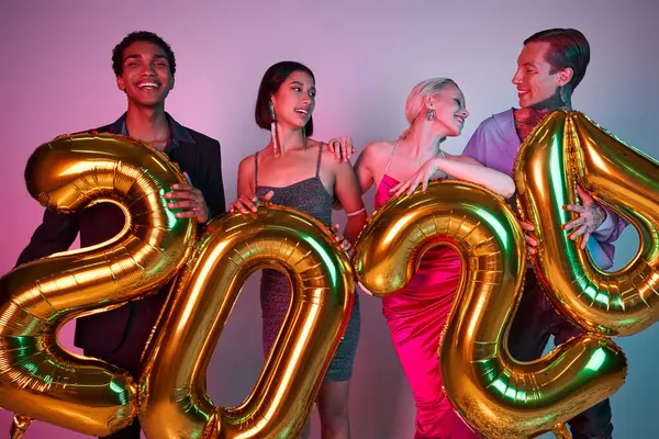 Merry Christmas and Happy New Year, positive multiethnic friends holding balloons with 2024 numbers — Stock Photo