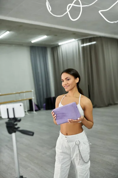 Graceful african american dancer in black crop sweater rehearsing in dance hall, horizontal banner — Stock Photo