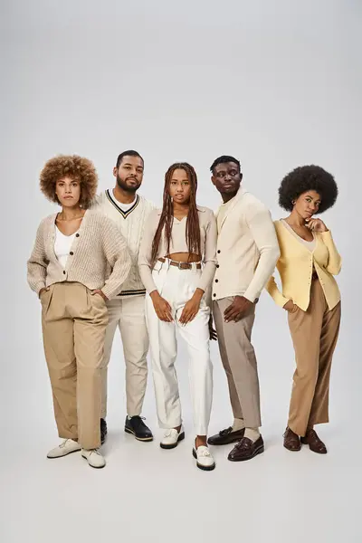 Five african american people in casual attire standing on grey background, Juneteenth concept — Stock Photo