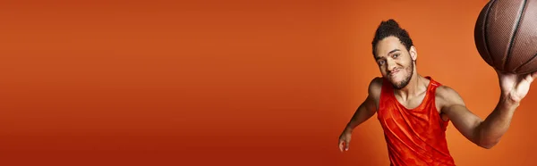 Jolly athletic african american man in sportwear with arms akimbo smiling joyfully at camera, banner — Stock Photo