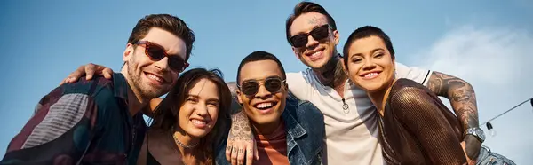 Happy young interracial friends in stylish urban attires smiling at camera at rooftop party, banner — Stock Photo