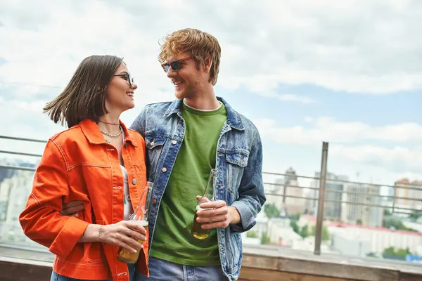 A man and a woman standing together, side by side — Stock Photo