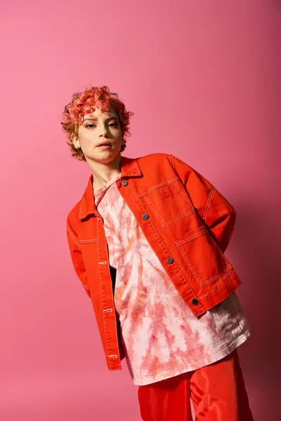 Young woman dazzling in vibrant red attire. — Stock Photo