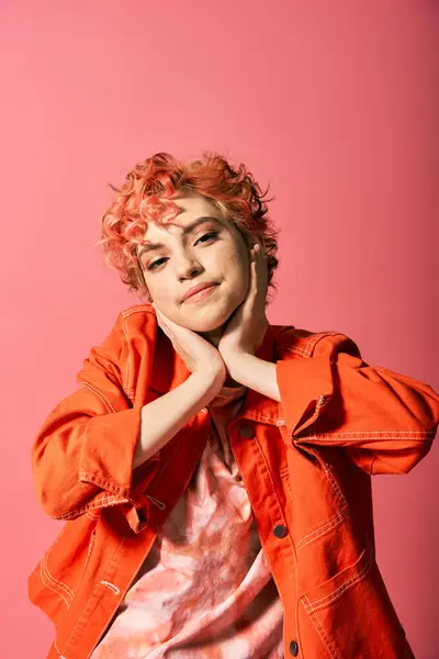 A young woman with red hair striking a pose. — Stock Photo