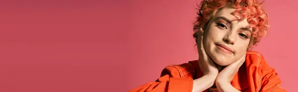 A vibrant woman dressed in an orange shirt up close. — Stock Photo