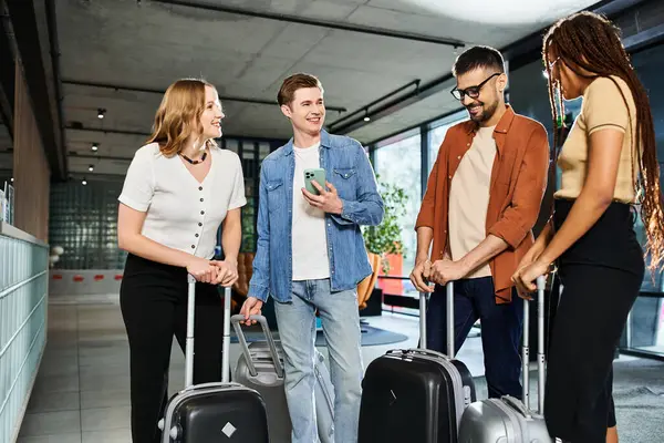 Diverse group of businesspeople in casual attire gather with luggage in hotel lobby, ready for a corporate trip. — Stock Photo