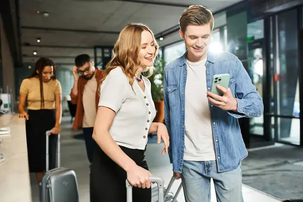 Multicultural colleagues on a corporate trip, walk with luggage — Stock Photo