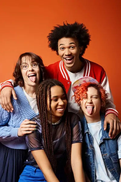 Young friends of diverse backgrounds and styles, including a nonbinary person, stand together in unity and friendship. — Stock Photo