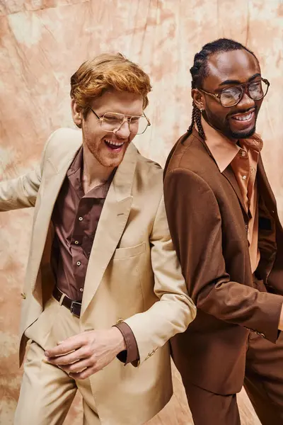 Two handsome men with dapper style stand confidently side by side. — Stock Photo